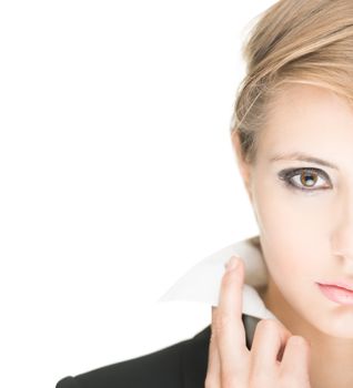 Portrait of stylish beautiful girl with long hair and bright make-up isolated on white background. Young business woman in black jacket and white blouse with raised collar looking serious and sexy.