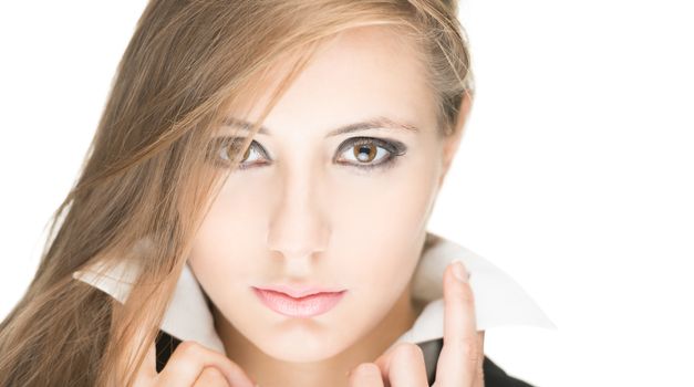 Portrait of stylish beautiful girl with long hair and bright make-up isolated on white background. Young business woman in black jacket and white blouse with raised collar looking serious and sexy.