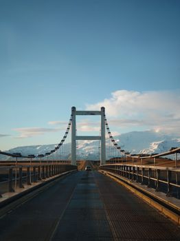 Jokulsarlon glacier lagoon bridge in Iceland at golden hour.