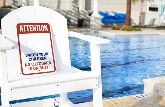 Safety Information Sign in the outdoors swimming pool