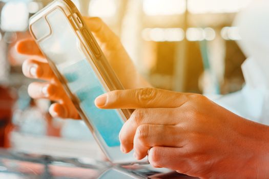Closeup Image of Women Hand holding a smartphone