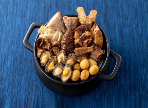 Traditional food of Chinese lunar new year, Buddha jumps over the wall, Chinese Soup Casserole dish, Buddha's Temptation, named Fo Tiao Qiang, close up.