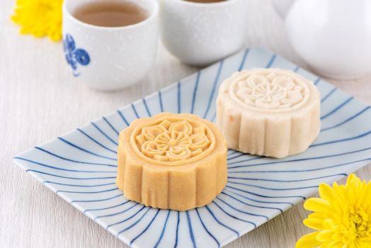 Colorful beautiful moon cake, mung bean cake, Champion Scholar Pastry cake for Mid-Autumn festival traditional gourmet dessert snack, close up.