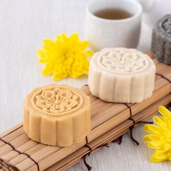Colorful beautiful moon cake, mung bean cake, Champion Scholar Pastry cake for Mid-Autumn festival traditional gourmet dessert snack, close up.