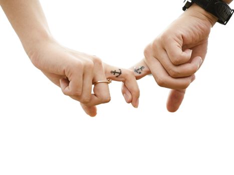 Couple in love hold each other's fingers as a symbol of their love High quality photo