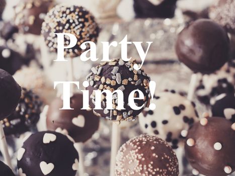 Soft focus of delicious cake pops with PARTY TIME overlay text.