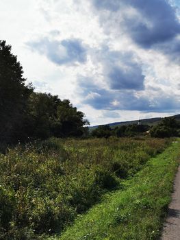 A sign on the side of a hill. High quality photo