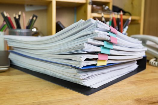 file folder and Stack of business report paper file on the table in a work office, concept document in work office