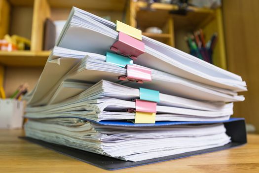 file folder and Stack of business report paper file on the table in a work office, concept document in work office