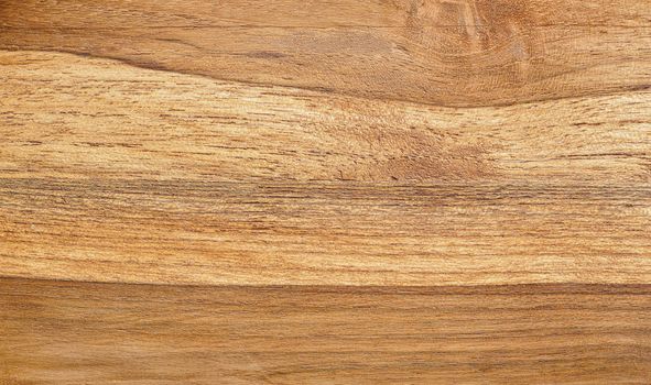 Wooden cutting board structure, closeup view from above.