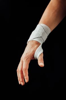 wrist and hand orthotics support for carpal tunnel syndrome healing, isolated on black