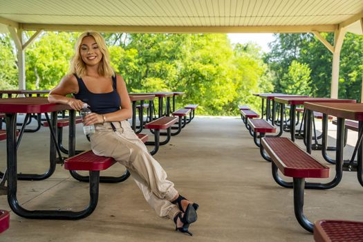 A gorgeous young blonde model enjoys a day outdoors while maintaining a safe distance from others during the Covid-19 pandemic