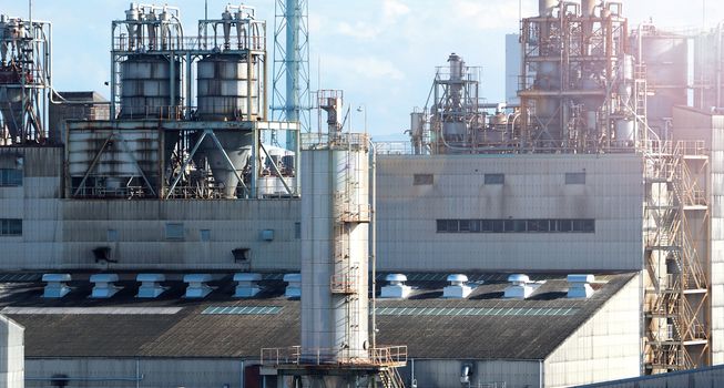 Petroleum plant or oil chemical factory and sunshine and sky in Osaka Kansai area of Japan.