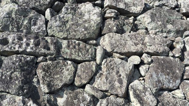 The strong and old stone wall texture from Himeji castle in Hyogo Japan. 
