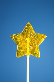 yellow star candy, blue background