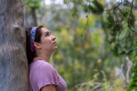 Real woman in the middle of the forest. face mask