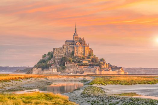 Mont Saint-Michel at sunset twilight in Normandy, northern France