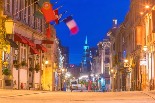 Old town Montreal at famous Cobbled streets at twilight in Canada