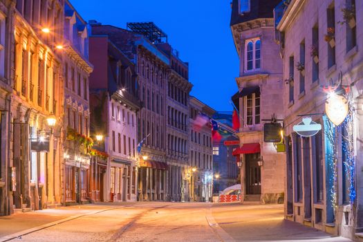 Old town Montreal at famous Cobbled streets at twilight in Canada