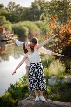 The young couple walking in the park