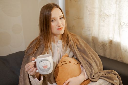 girl with a cup of coffee	or tea