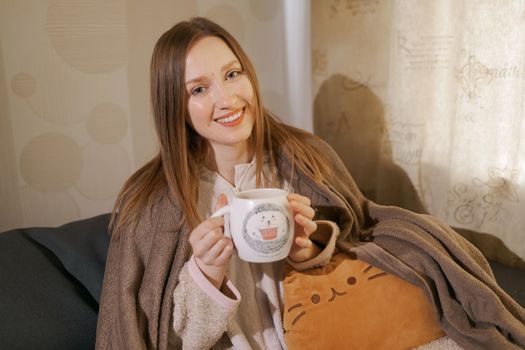 girl with a cup of coffee	or tea