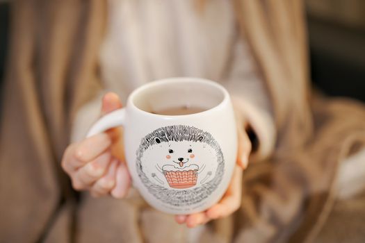 girl with a cup of coffee	or tea