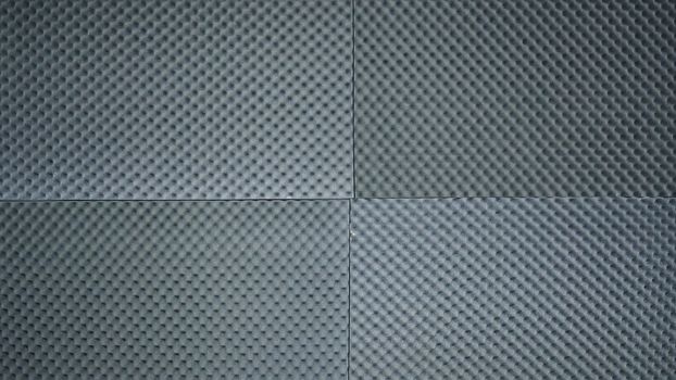 Sound absorber sheet grey color and very soft material for professional sound recording studio.