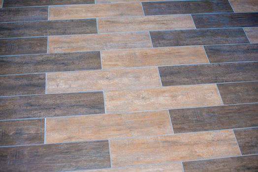 Wooden flooring forming a pattern on floor