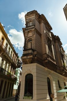 Havana, Cuba - 8 February 2015: Example of colonial architecture at Passeo Marti with balconies and wide windows, building at 5 esquinas
