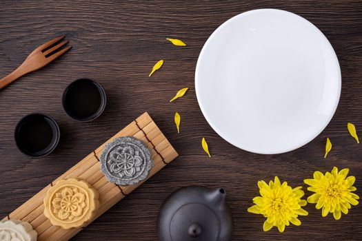 Colorful beautiful moon cake, mung bean cake, Champion Scholar Pastry cake for Mid-Autumn festival traditional gourmet dessert snack, top view, flat lay.