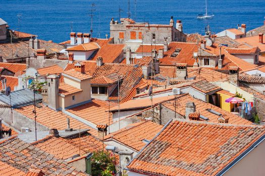 Quaint streets and rooftops on a hot summer's day in the iconic town of Piran in Slovenia