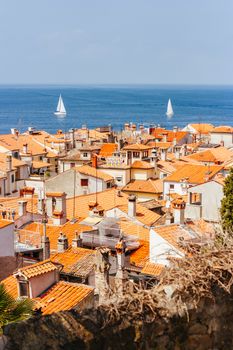 Quaint streets and rooftops on a hot summer's day in the iconic town of Piran in Slovenia