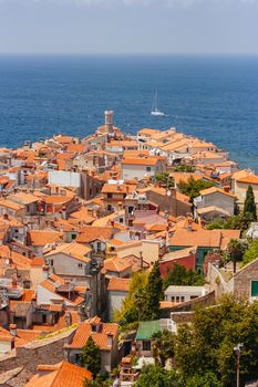 Quaint streets and rooftops on a hot summer's day in the iconic town of Piran in Slovenia