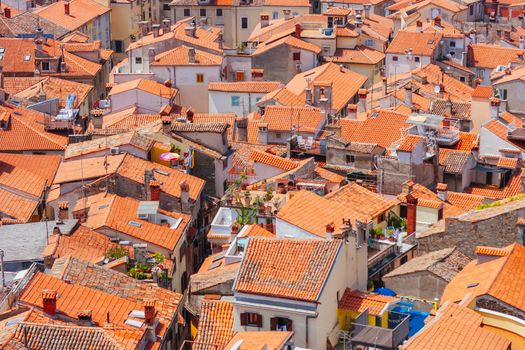 Quaint streets and rooftops on a hot summer's day in the iconic town of Piran in Slovenia