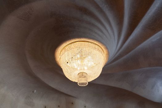 Barcelona, Spain - 30 July 2020: Casa Batllo Ceiling and chandelier close-up,