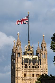 Victoria Tower, Houses Of Parliament, Palace of Westminster, London, England, UK with the Union Flag flying above. High quality photo