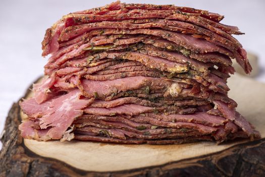 stack of sliced pastrami meat