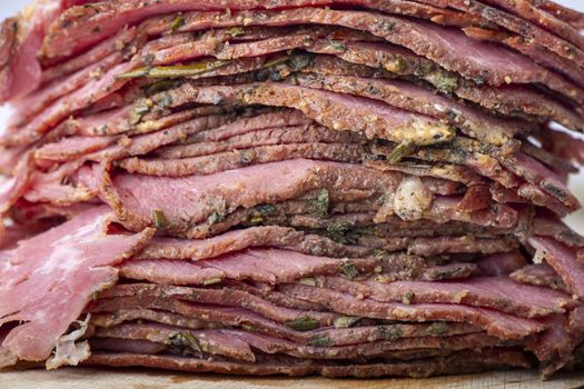 stack of sliced pastrami meat