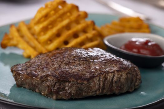grilled steak with fresh potato lattices