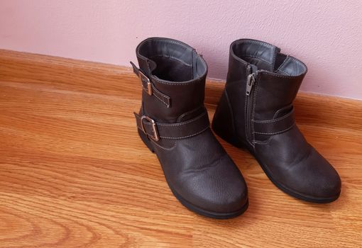 Winter leather shoes for little girls. Black color.