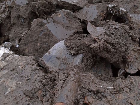 Digging in the garden, soil very moist and sticky.