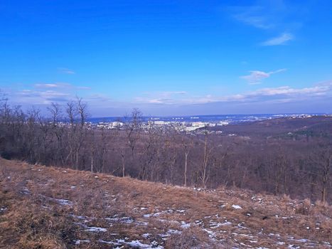 A City photographed from a distance landscape.