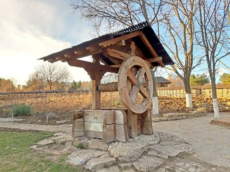 Old Wooden Garden Well. Decorative wooden well.