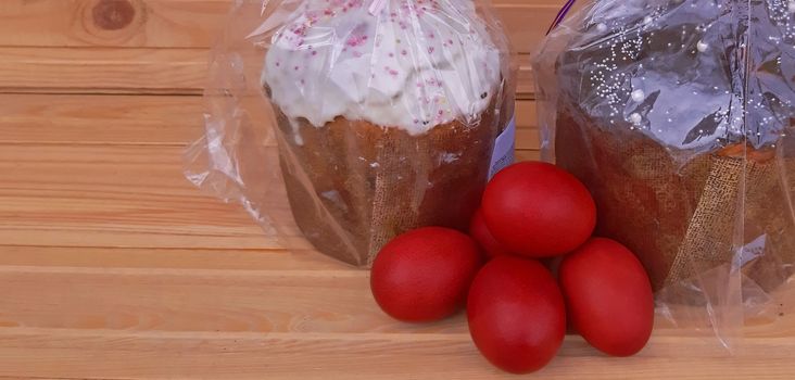 Red eggs and Easter cakes. Easter holiday.