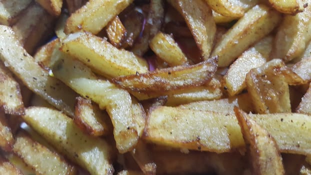 Potato fried or roasted slices on clean background with copy space for text
