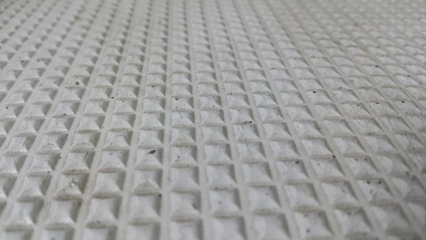closeup and perspective view of grey color beautiful 3D geometric shapes of floor tiles
