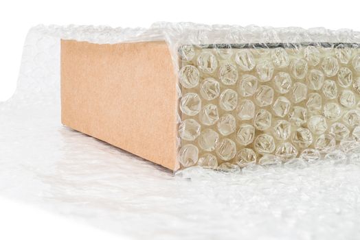 Bubbles covering the box by bubble wrap for protection product cracked isolated white background