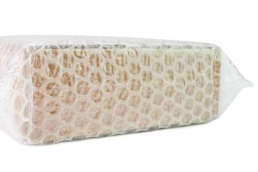 Bubbles covering the box by bubble wrap for protection product cracked isolated white background
