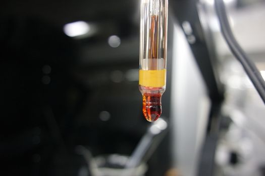 Close-up view of pH meter, a device for measuring pH with equipment for analysis of solutions quality in a chemical laboratory